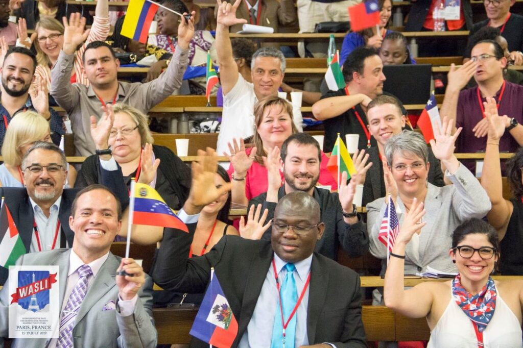 group of diverse people with country flags Columbia Niger Brazil